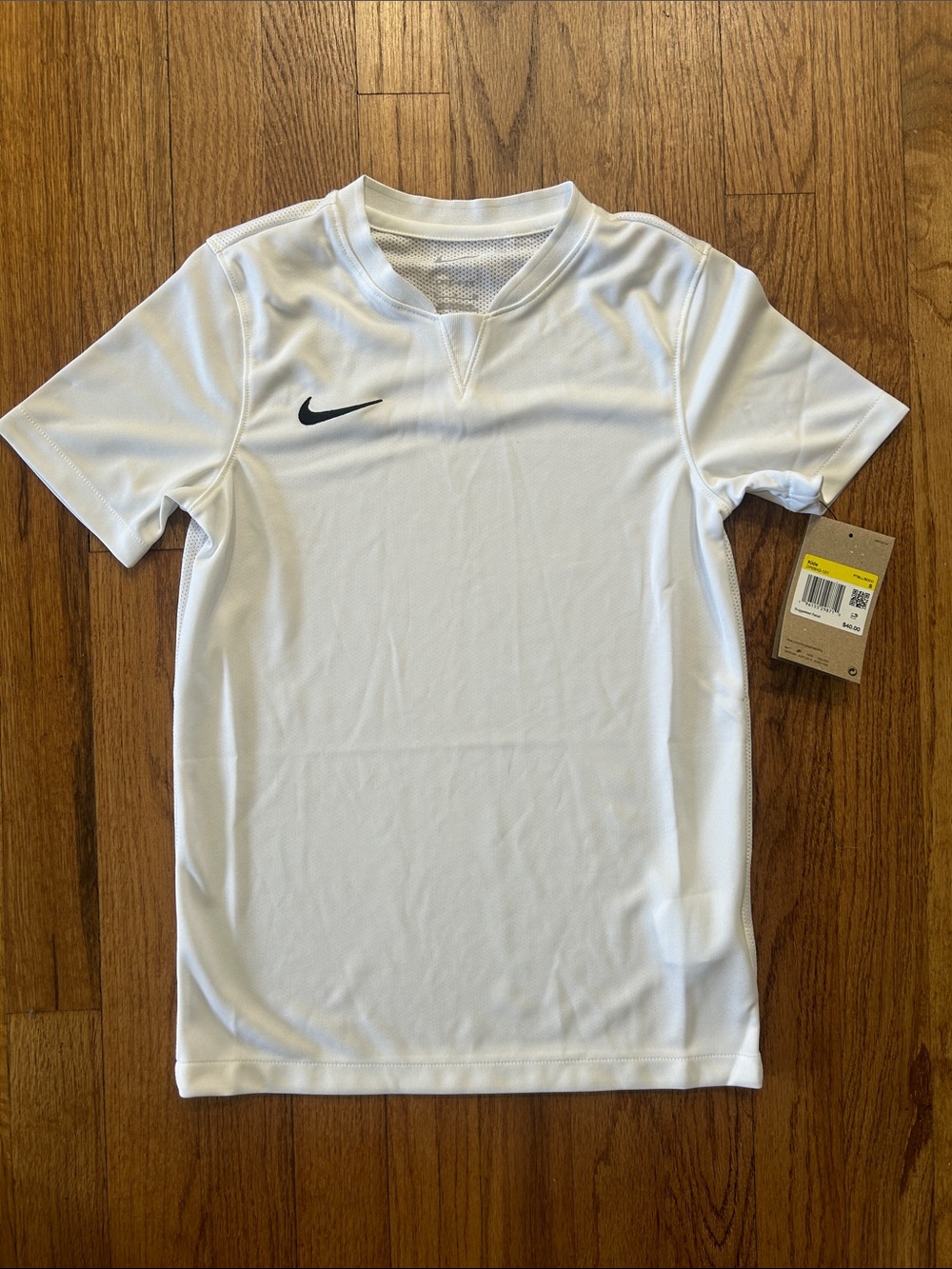 Nike White Youth Short-Sleeve Performance Shirt with Black Swoosh